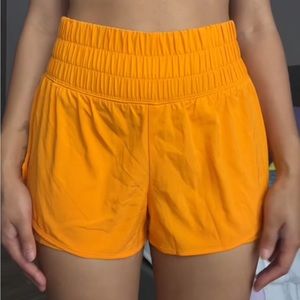 Size small orange shorts